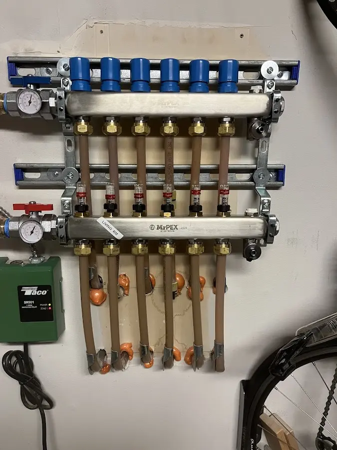 Plumber performing Leak Detection at a residential property in Wallingford